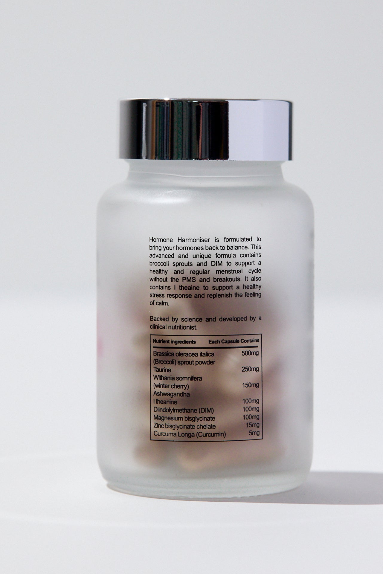 Supplement bottle with label on a white background